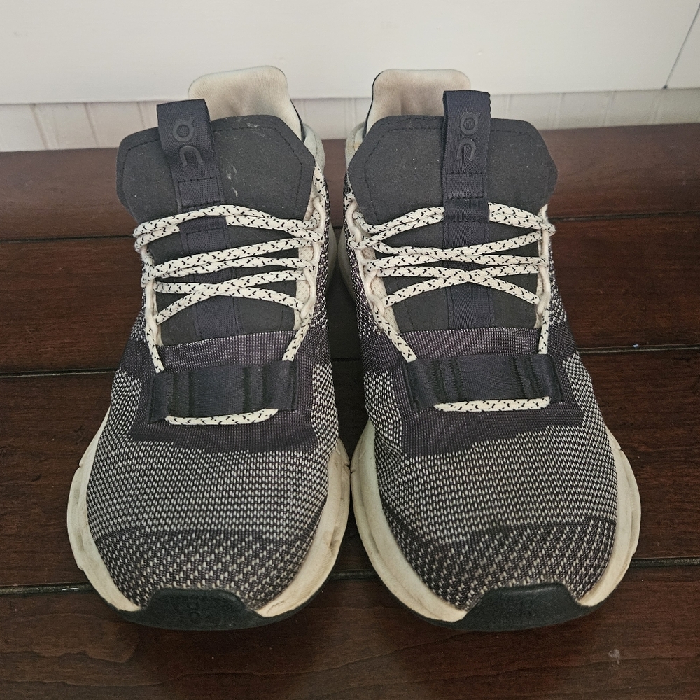 On Running Black and White Sneakers